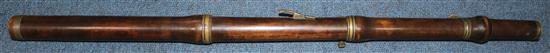 An early 19th century brass mounted concert flute, 23.75in.
